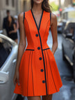 FJØRNA vibrant orange button-front A-line dress displayed on a hanger, showcasing its bright color and classic silhouette.