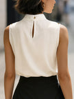 Ivory satin sleeveless blouse for women with high neck design by FJØRNA, showcasing elegant and smooth fabric.