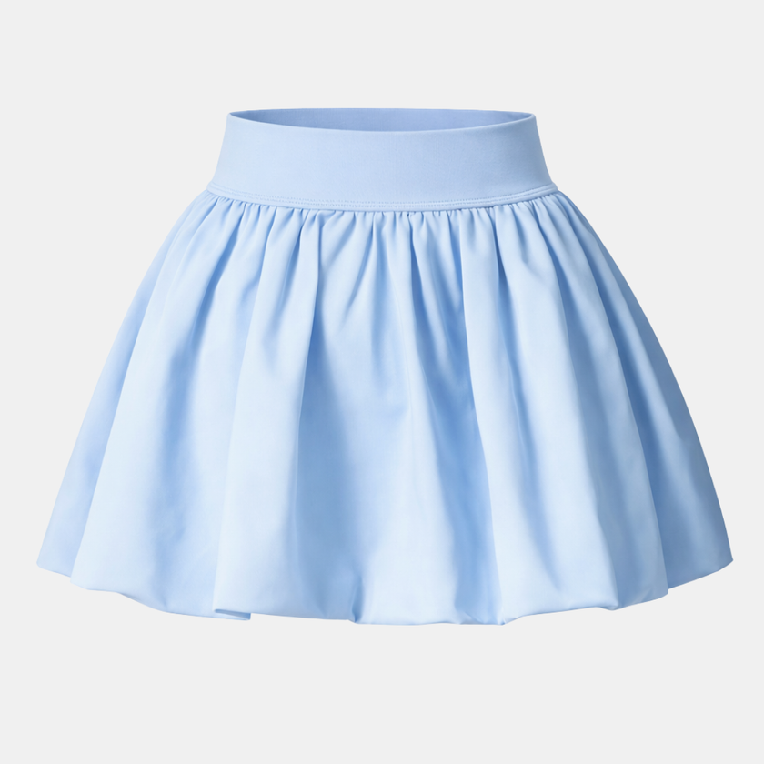 FJØRNA women's high waist tennis skort with built-in shorts, lightweight and breathable for active tennis play.