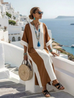 FJØRNA women's summer maxi dress with short sleeves, flowy and lightweight fabric, perfect for warm weather and casual wear.