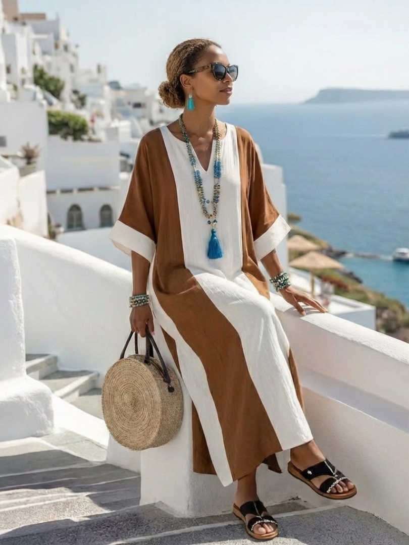 FJØRNA women's summer maxi dress with short sleeves, flowy and lightweight fabric, perfect for warm weather and casual wear.