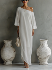 Women's ivory white cotton-linen blend mini dress by FJØRNA, showcasing a stylish and breathable summer dress with a fitted silhouette.