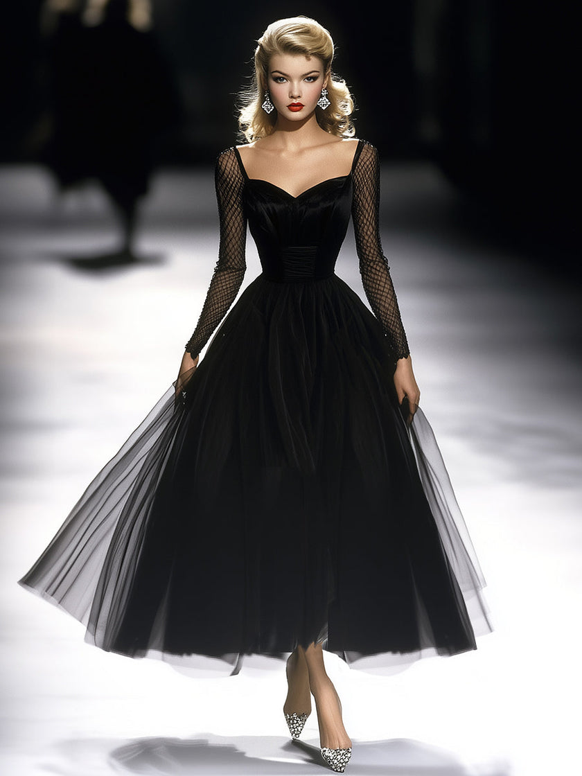 FJØRNA black maxi dress for women, flowy sleeveless dress with a fitted waist and elegant length, perfect for formal or casual occasions.