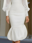 FJØRNA high-neck sheer sleeve bubble-hem midi dress for women, featuring elegant design and flowing fabric.