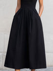 Black sleeveless square-neck midi dress by FJØRNA, featuring a fitted silhouette and elegant design for women.