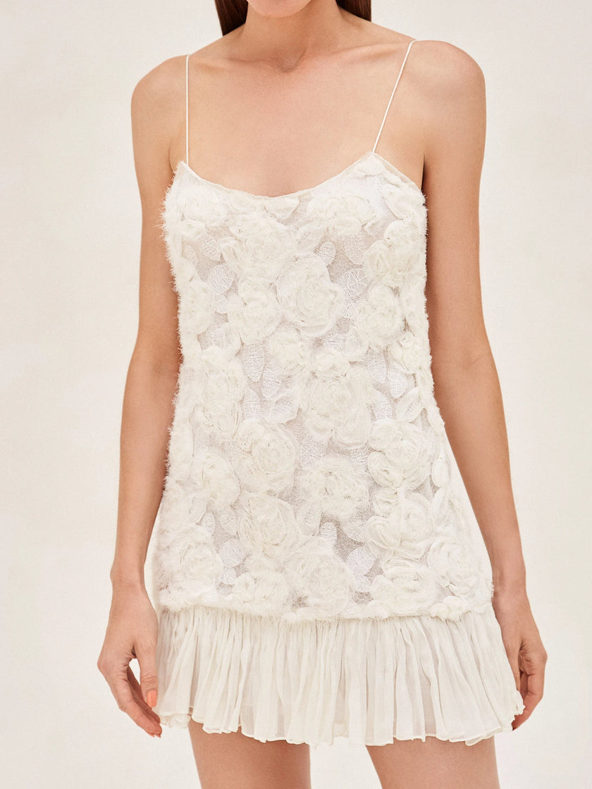 FJØRNA Blanc Rosette-Detailed Georgette Mini Dress with delicate rosette accents and flowy fabric, perfect for elegant occasions.