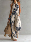 White ink wash print halter neck wide-leg sleeveless jumpsuit with pockets by FJØRNA, shown on a model.