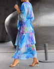 Red chiffon midi dress for women with V-neck, ruffle details, and printed design by FJØRNA, perfect for elegant occasions.