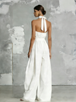 FJØRNA woven halter-neck sleeveless jumpsuit for women with wide-leg pants, elegant and stylish for summer wear.