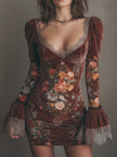 FJØRNA vintage floral velvet lace mini dress hanging on a wooden hanger, showcasing its intricate lace and floral pattern.
