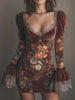 FJØRNA vintage floral velvet lace mini dress hanging on a wooden hanger, showcasing its intricate lace and floral pattern.