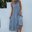 FJØRNA summer casual wedding dress, lightweight and elegant with soft fabric and floral details, perfect for outdoor ceremonies.