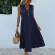 FJØRNA summer casual wedding dress featuring lightweight fabric, sleeveless design, and elegant floral pattern for special occasions