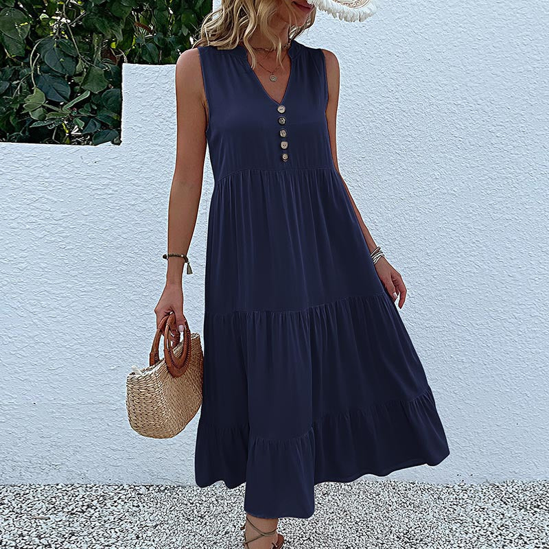 FJØRNA summer casual wedding dress featuring lightweight fabric, sleeveless design, and elegant floral pattern for special occasions