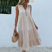 FJØRNA summer casual wedding dress with flowy fabric and elegant design, perfect for outdoor wedding occasions.