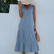 FJØRNA summer casual wedding dress with lightweight fabric, sleeveless design, and elegant silhouette for special occasions.