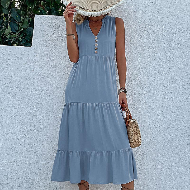 FJØRNA summer casual wedding dress with lightweight fabric, sleeveless design, and elegant silhouette for special occasions.