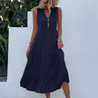FJØRNA summer casual wedding dress featuring lightweight fabric, elegant design, and relaxed fit for special occasions.