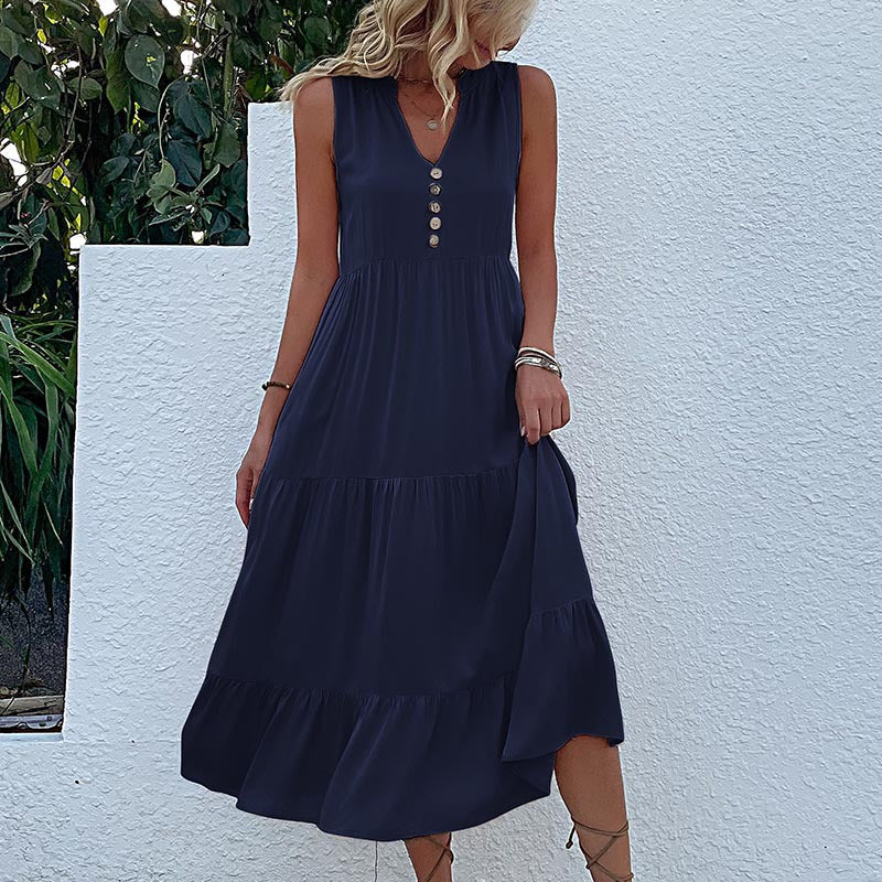 FJØRNA summer casual wedding dress featuring lightweight fabric, elegant design, and relaxed fit for special occasions.