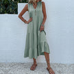 FJØRNA summer casual wedding dress with lightweight fabric, sleeveless design, and elegant fit perfect for outdoor weddings.