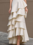 Ivory FJØRNA one-shoulder tiered ruffle gown, white maxi dress for women with flowing fabric and elegant design.