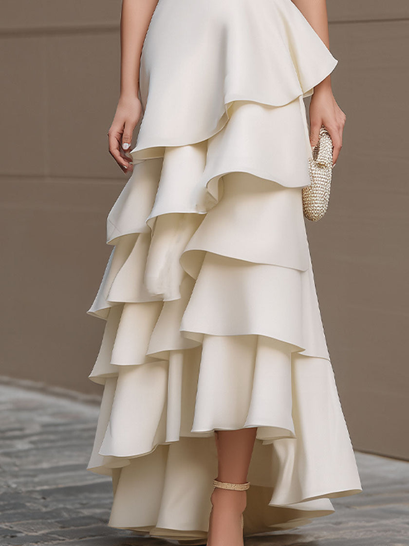 Ivory FJØRNA one-shoulder tiered ruffle gown, white maxi dress for women with flowing fabric and elegant design.