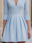 FJØRNA elegant powder blue pleated fit-and-flare dress for women, showcasing a flowy silhouette and stylish design.