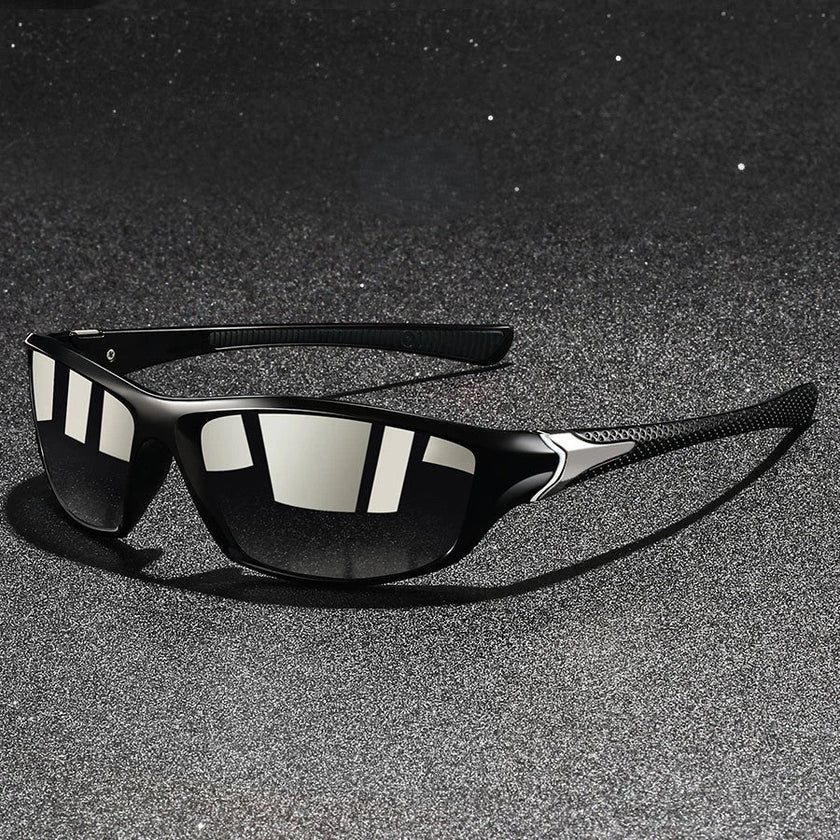 FJØRNA polarized men's sunglasses with black frames and dark lenses, accessory for stylish sun protection.