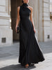 FJØRNA one-shoulder draped high-neck maxi dress in elegant black with flowing fabric and asymmetric design.