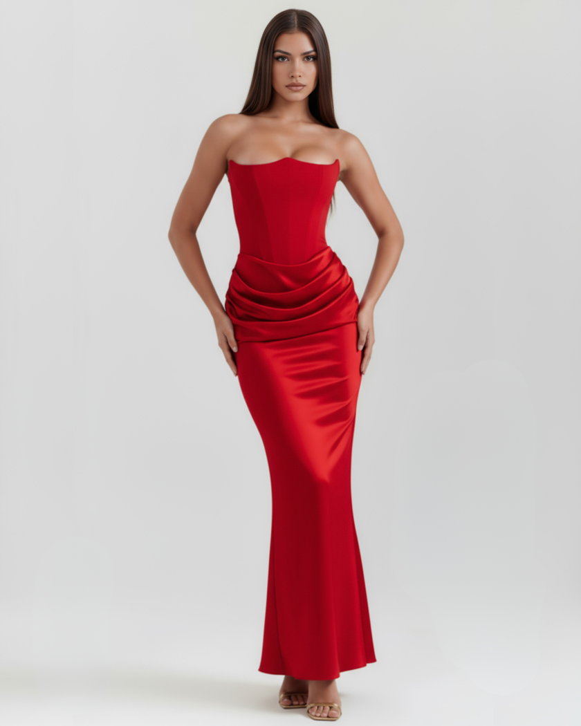 FJØRNA women's strapless corset maxi dress with ruched detail, featuring a fitted bodice and flowing skirt in topaz color.