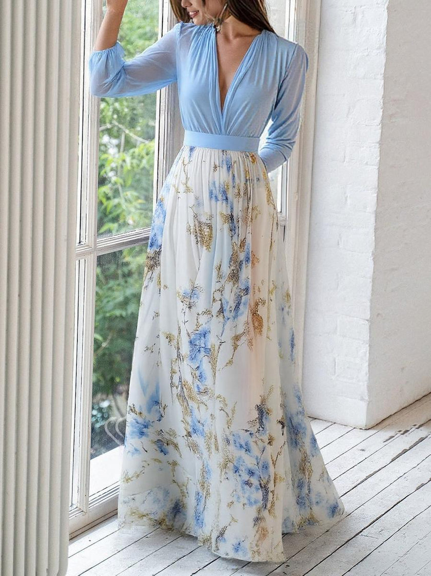 FJØRNA women's summer maxi dress with floral pattern, flowy lightweight fabric, relaxed fit, perfect for warm weather.