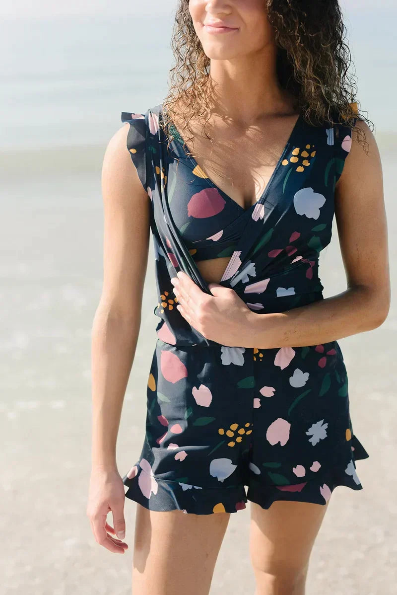 FJØRNA women's summer tankini set with ruffles and V-neck, featuring a stylish two-piece swimsuit for beach or pool.