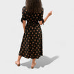 FJØRNA women's summer mini dress with polka dots and V-neck, lightweight and stylish for warm weather.