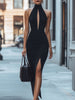 FJØRNA black halter neck slit gown, elegant maxi dress with flowing fabric and stylish design, perfect for formal occasions.