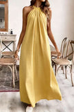 FJØRNA solid color loose halter neck backless casual maxi dress, perfect for casual wear or weddings, with flowing silhouette.