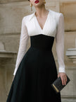 FJØRNA contrast bodice A-line midi dress with sheer long sleeves, elegant and stylish for women, shown on a model.