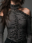 Black striped high neck cold-shoulder ruched t-shirt by FJØRNA showing the stylish design and ruched detail on the fabric.