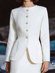 FJØRNA elegant tailored skirt suit with sculpted peplum jacket, featuring a mini dress style for women, shown in the image.