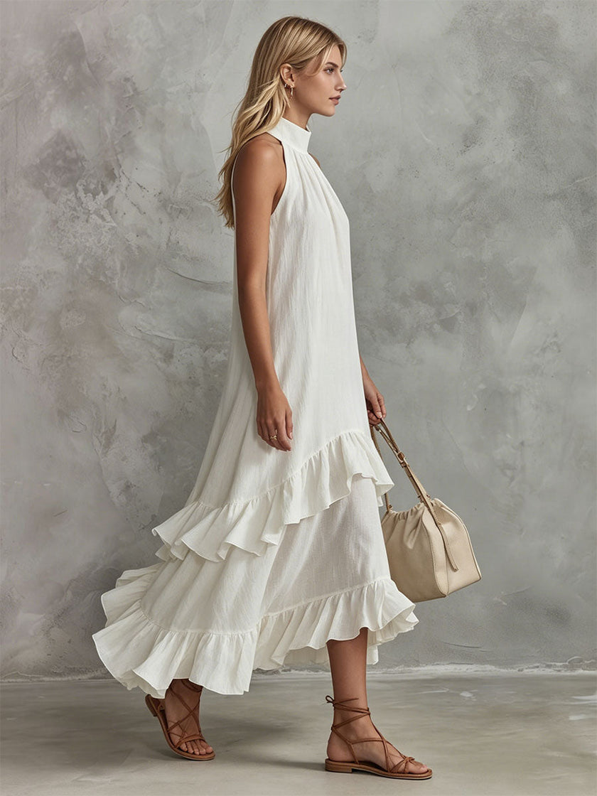 FJØRNA white sleeveless midi dress with ruffled cotton-linen fabric, featuring a retro-elegant style perfect for women.