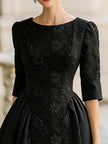 FJØRNA elegant jacquard short-sleeve A-line midi dress for women, showcasing a stylish midi dress design with intricate jacquard fabric.