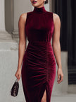 FJØRNA burgundy velvet sleeveless turtleneck ruched maxi dress, elegant and form-fitting for formal occasions.