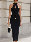FJØRNA black halter neck cutout midi bodycon dress showing fitted silhouette and stylish cutout details on the front.