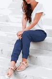 FJØRNA Tara women's drawstring jogger pants with elastic ankle cuffs, soft fabric and relaxed fit, displayed on a model.