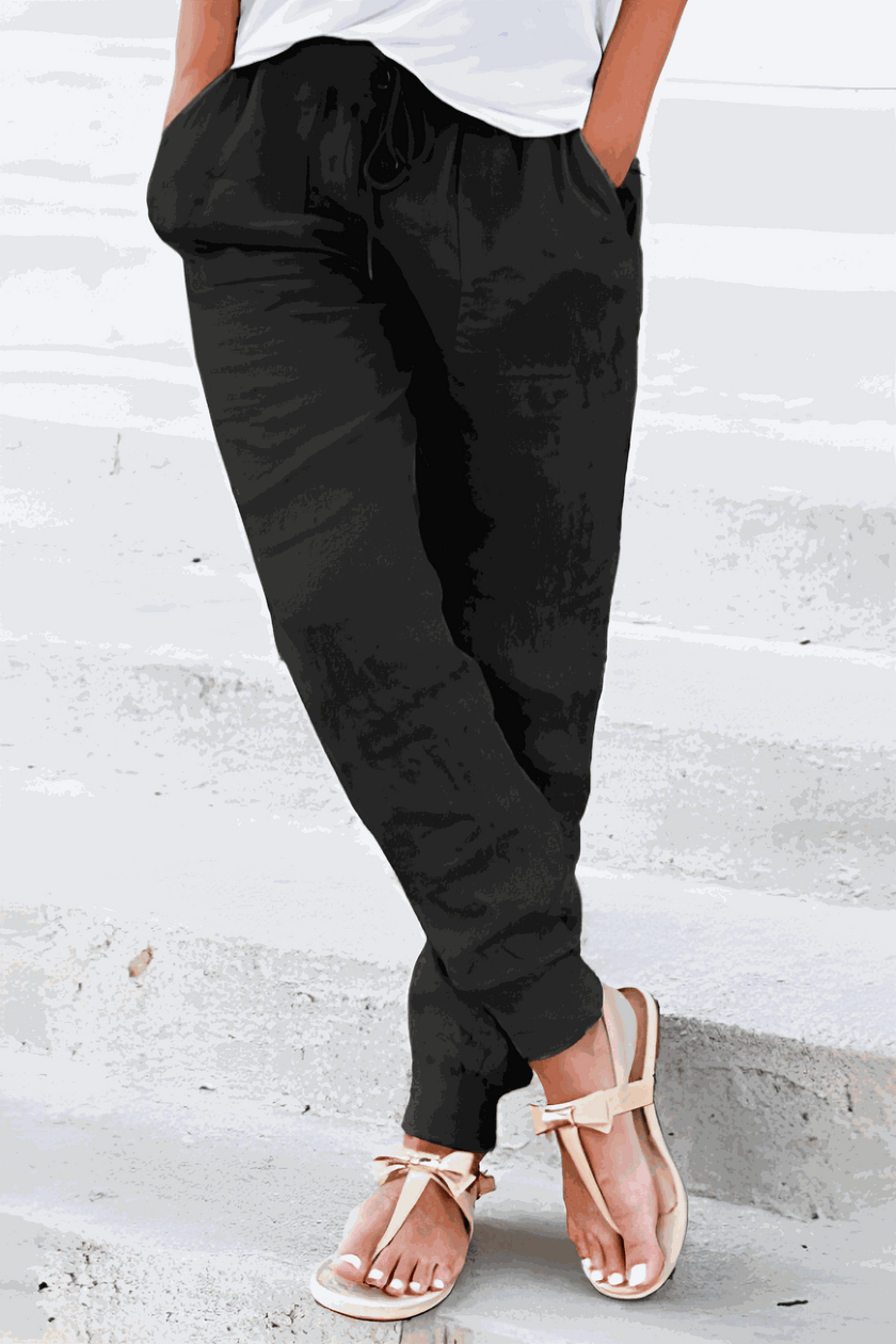 FJØRNA Tara women's drawstring jogger pants with elastic ankle cuffs and comfortable fit, shown in a relaxed style.