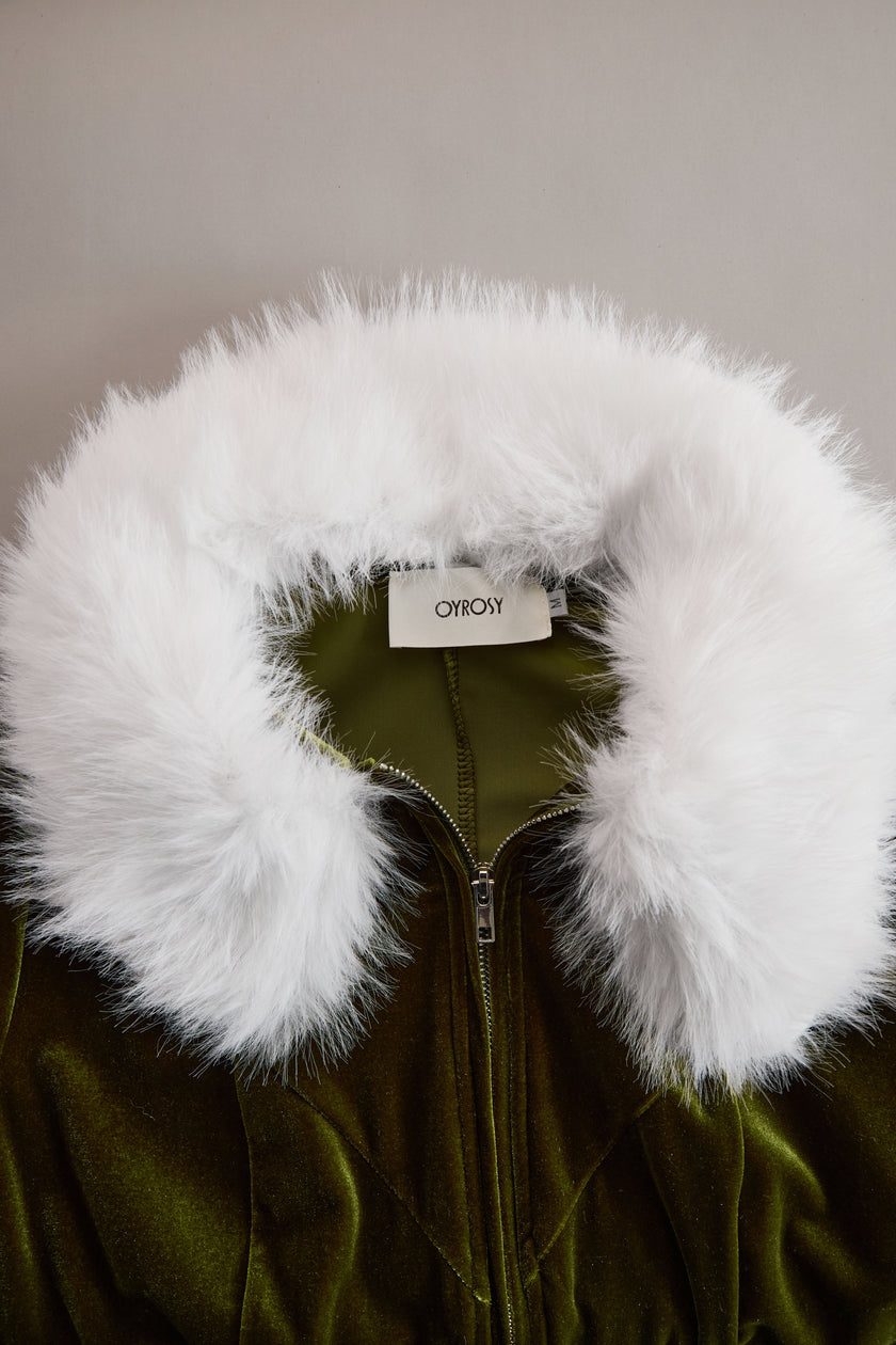 Rose red velvet faux fur collar flared jumpsuit by FJØRNA, showing the stylish fitted bodice and flared pant legs.