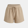 FJØRNA women's relaxed fit drawstring shorts, casual pants with a comfortable waistband, in a neutral color.