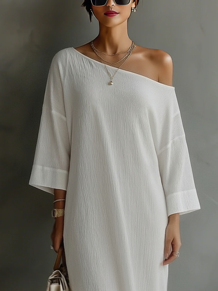 Women's ivory cotton-linen blend mini dress by FJØRNA, featuring a stylish and lightweight summer dress with a relaxed fit.