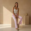 FJØRNA women's lounge trousers with elastic waist and side pockets, comfortable casual pants for relaxed wear.