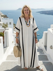 FJØRNA women's summer maxi dress with short sleeves, striped pattern, flowy lightweight fabric, perfect for warm weather.