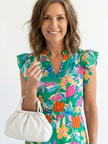 FJØRNA women's floral tiered summer midi dress with a flowing design and vibrant floral pattern, perfect for warm weather.